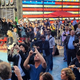 Illustration for article titled Poor People Photograph Rich People on Times Square Jumbotron